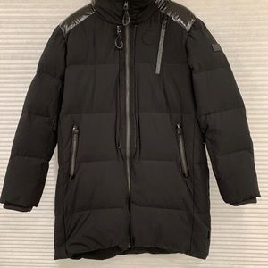 TUMI Men’s Puff Parka Jacket. Color Black. Size Medium.